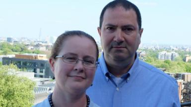 Shivaun and Adam Raff pictured with the London skyline in the background