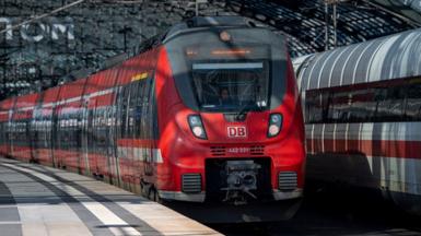 A DB Deutsche Bahn passenger train is seen at the Berlin Hauptbahnhof main railway station in Berlin.