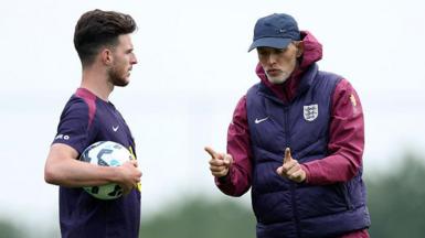 Declan Rice and Thomas Tuchel talking in England training