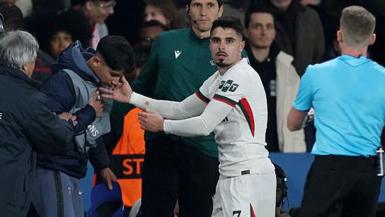 Pedro Neto looks bemused after pushing a PSG ball boy over
