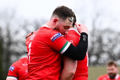 Joe Baldwin and Lloyd Roby of North Wales Crusaders embrace