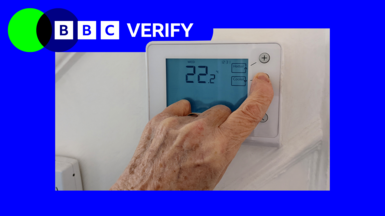 A BBC Verify promo image. It shows a thermostat, reading 22.2, being adjusted by an older person.