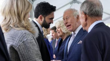 New York City Mayor Zohran Mamdani greets a smiling King Charles with Camilla and others in the background, in New York on 29 April.