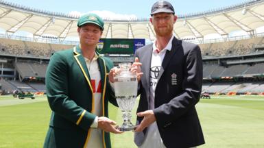 Captains Steve Smith and Ben Stokes pose with the Ashes trophy