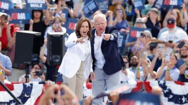 Kamala Harris and Tim Walz at a campaign event