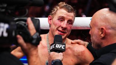 A brusied Paddy Pimblett speaks on the UFC mic