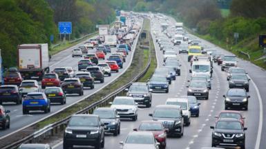Hundreds of cars queuing in both directions on a British motorway