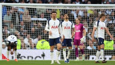 Tottenham's players react after conceding a late equaliser against Brighton 