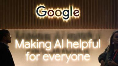 Google logo and "Making AI helpful for everyone" sign seen at an event in Poland on May 16 2024