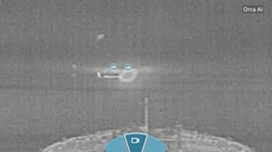 A thermal imaging camera clip captures an explosion after a collision of two ships