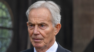 Tony Blair, pictured wearing a dark suit 