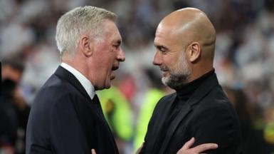 Carlo Ancelotti and Pep Guardiola embrace