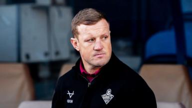 Luke Robinson, then head coach of Huddersfield Giants, looks on from the touchline.
