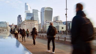 People commuting to work in London