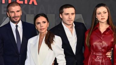 David and Victoria Beckham pose with Brooklyn Beckham and Nicola Peltz at the premiere of David’s self-titled 2023 Netflix documentary
