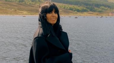 Claudia Winkleman by the sea