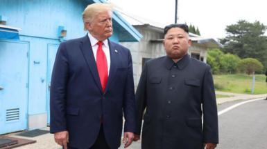 North Korean leader Kim Jong Un and US President Donald Trump inside the demilitarized zone (DMZ) separating the South and North Korea on 30 June 2019