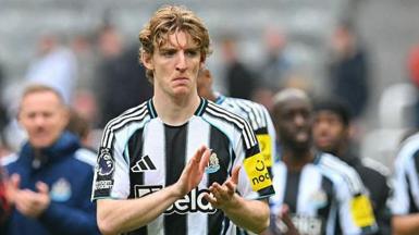 Anthony Gordon applauds Newcastle fans after the Sunderland defeat