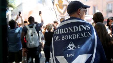 A Bordeaux fan looks on