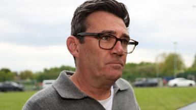 Andy Burnham at a charity football match at Broadhurst Park in Moston, England