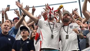 England supporters celebrate after winning the 2026 World Cup round of 32 match football between England and the Democratic Republic of Congo