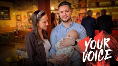 Ben Richmond and his wife and child