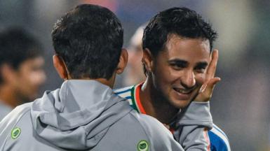 India head coach Gautam Gambhir (left) embraces batter Abhishek Sharma (right) after victory over New Zealand
