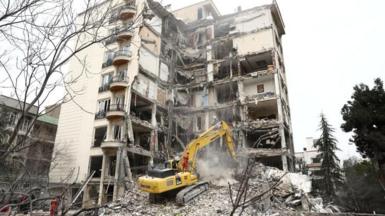 A view of a residential building damaged by a strike, amid the US-Israeli conflict with Iran, in Tehran, Iran, March 23, 2026
