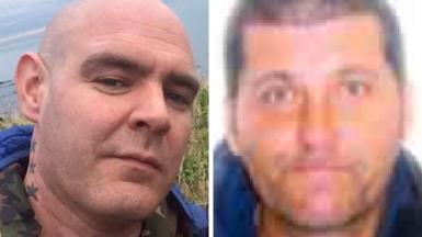 Two men side by side. They are in close up. The man on the left is bald with stars tattooed on his neck. The man on the right has dark hair.