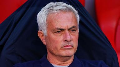 Jose Mourinho looks on in the Benfica dugout