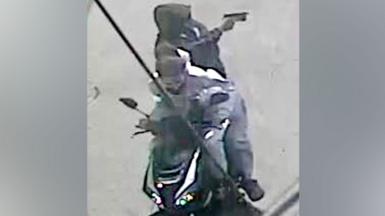 CCTV footage of the two suspects on a moped.