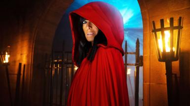 Claudia Winkleman in the new red Traitors Cloak