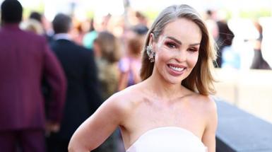 Katie Piper at the Bafta TV awards 2025, wearing a strapless white gown.