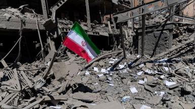 The remains of a damaged building in Tehran following an airstrike. 