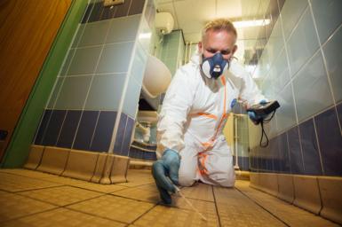 Man cleaning the floor