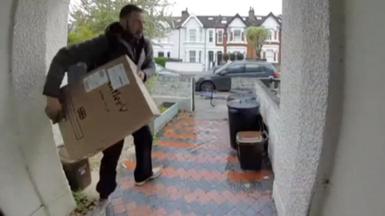 A parcel being carried away from a doorstep 
