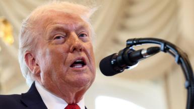 US President Donald Trump speaks at a ceremony held to dedicate a 4-mile stretch of road from West Palm Beach Airport to his Mar-a-Lago estate as 'President Donald J. Trump Boulevard', at the Mar-a-Lago estate in Palm Beach, Florida, U.S., January 16, 2026. 