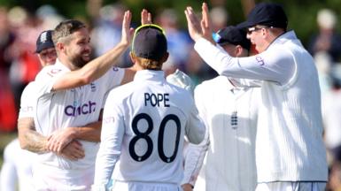 Chris Woakes celebrates a wicket