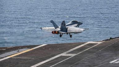 A US fighter jet takes off. 