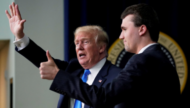 Trump and Kirk stand in profile in suits with a blurred presidential seal behind them. Kirk is giving a thumbs-up and Trump is waving