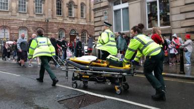  A large emergency service presence is pictured on Water Street after a car reportedly drives into the crowd during the Liverpool Trophy Parade on May 26, 2025 in Liverpool, England.