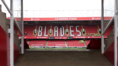 General view inside the Sheffield United's stadium with Blades written across the seats