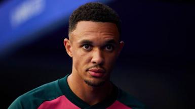 Trent Alexander-Arnold wearing Real Madrid training gear at the Santiago Bernabeu stadium