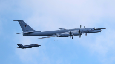 Handout photo issued by Ministry of Defence of a F-35B fighter launched from HMS Prince of Wales intercepting a Russian Tupolev Tu-142 maritime reconnaissance and anti-submarine warfare (ASW) aircraft.