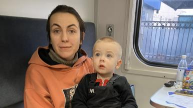 Mother and child on a train