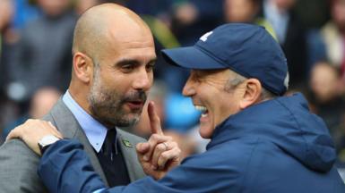 An image of Pep Guardiola and Tony Pulis laughing and smiling to each other when Manchester City played West Brom in 2017