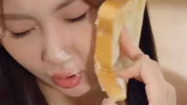 A woman is slapped with a slice of bread in a South Korean micro-drama