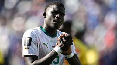 El Hadji Malick Diouf claps while playing for Senegal