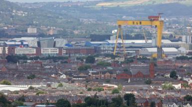 One of the cranes looming above the city