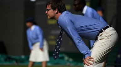 line judge looks down the line